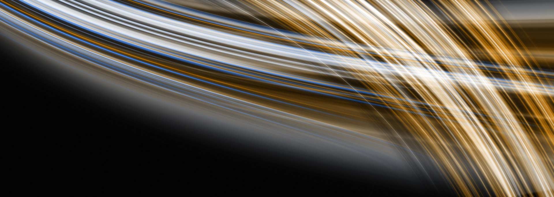 Background graphic of gray and gold wispy lines.